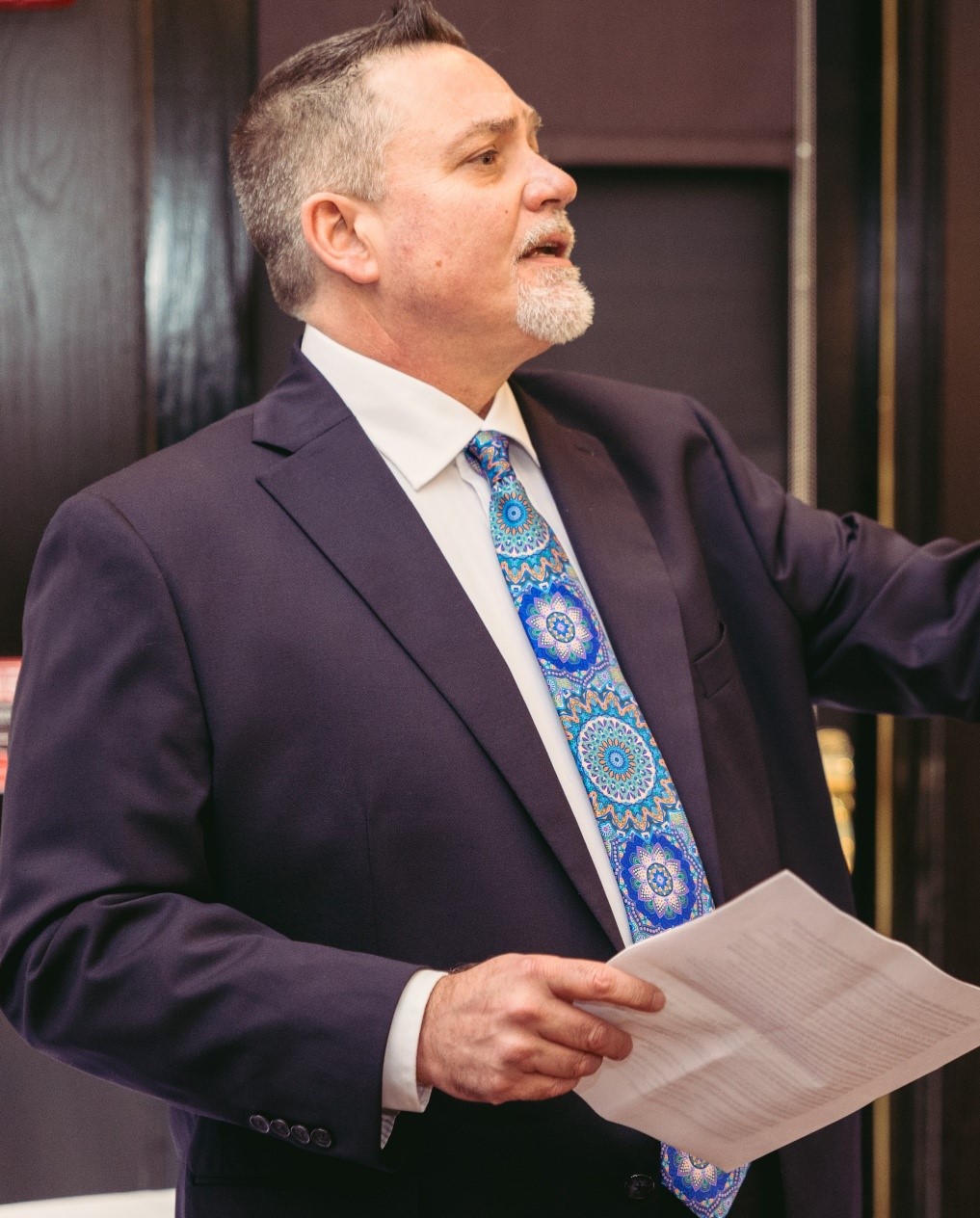 Attorney Anthony Rumore holding legal documents
